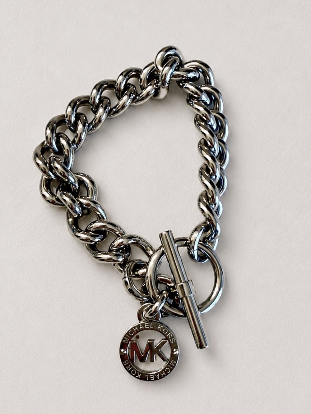 Michael Kors Silver Tone Chunky Chain Toggle MK Logo Charm Bracelet